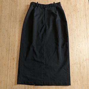 Taboo International Skirt with mild slit Black in color size 9 with belt loops